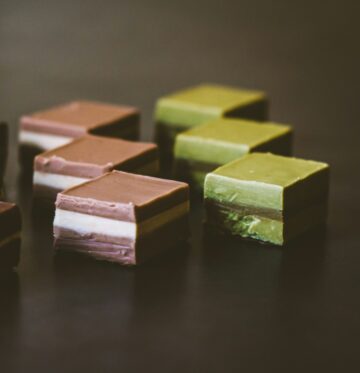desserts on black surface